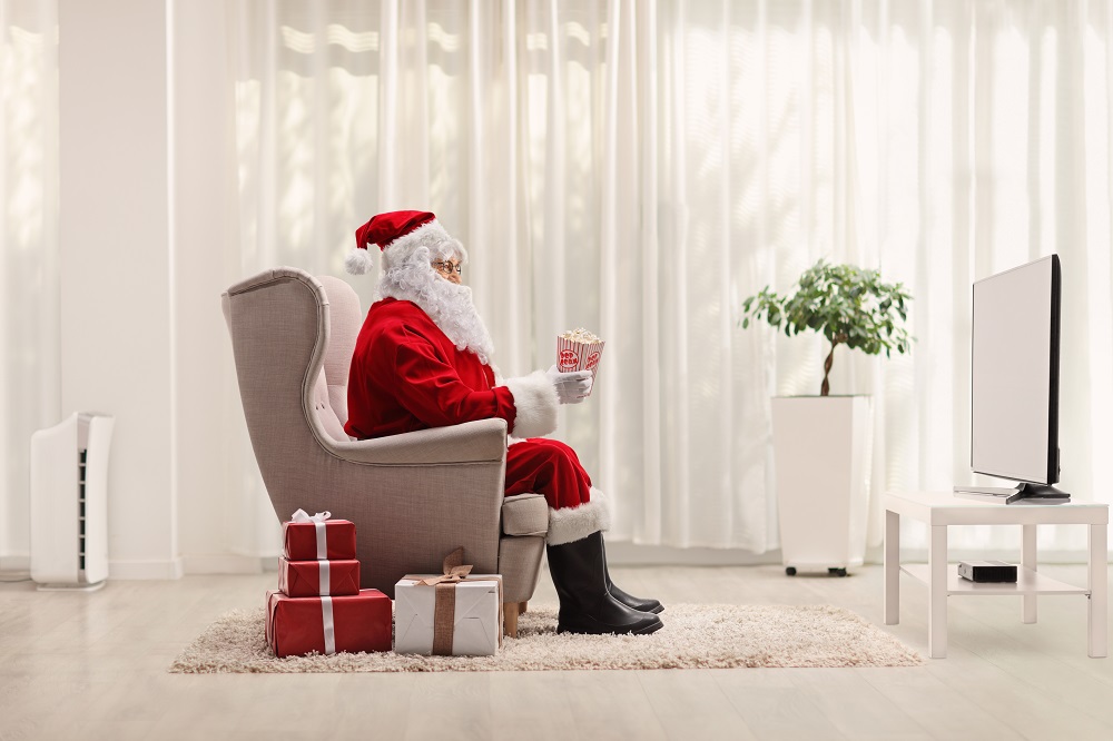Adobe Stock Photo, licensed number 391400856, Santa Claus watching TV.