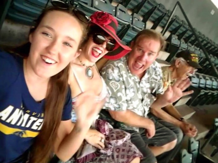 Baseball time with fam: fave little cousin, husband and Dad … oblivious to all but the field. Angels Stadium, Anaheim (not L.A.). Photo: Rebecca Brower, Summer 2016.